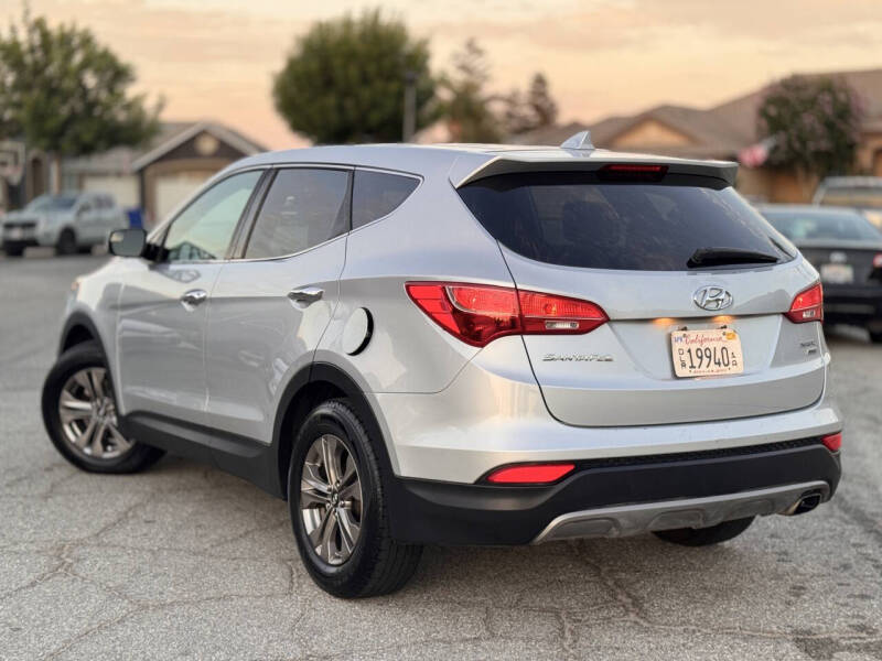 hyundai santa fe 2015 5XYZTDLB2FG295334 image hyundai santa fe 2015 5XYZTDLB2FG295334 image